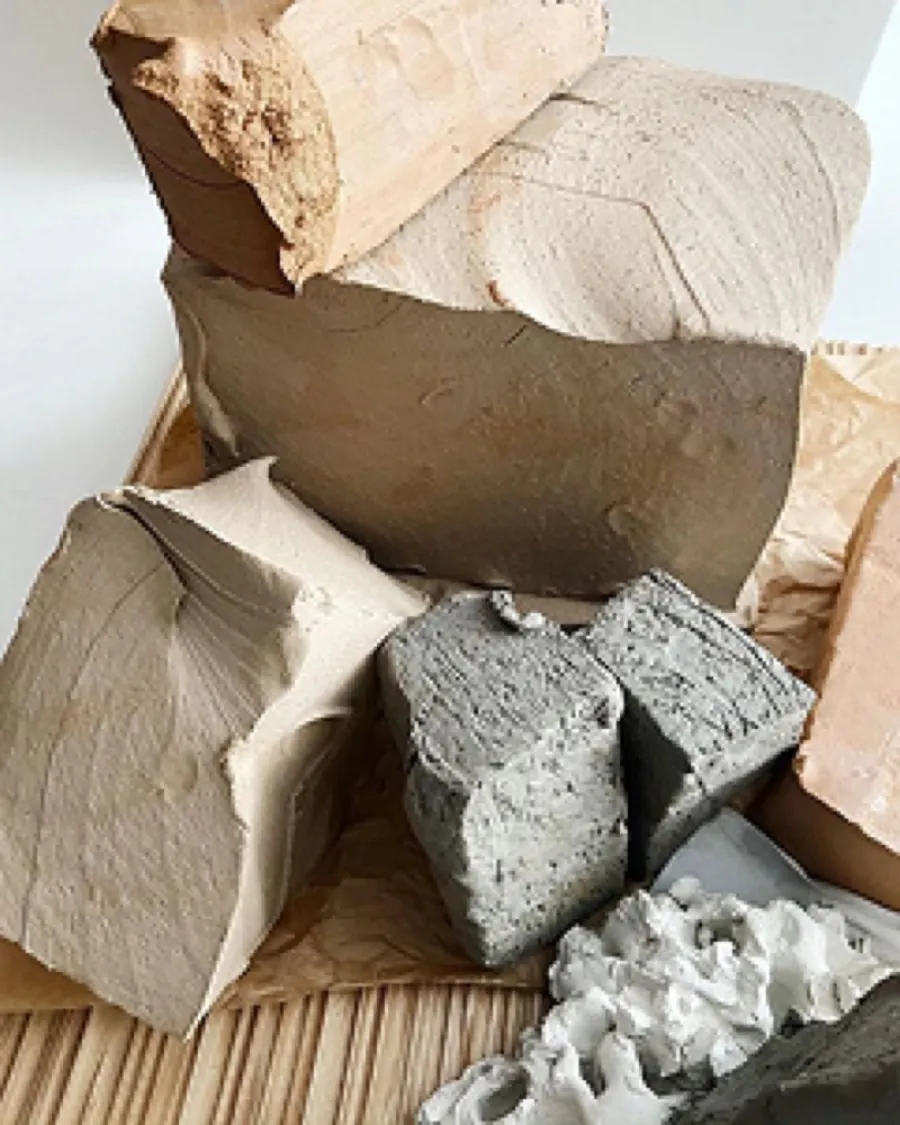 Blocks of raw stoneware clay used at the CHELÓNA studio
